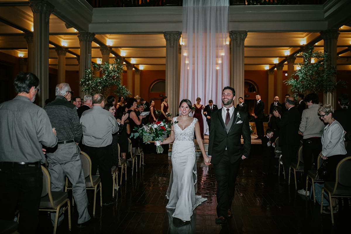 Rachel Traxler Photography, Landmark Center, Landmark Center wedding, Saint Paul wedding, wedding venues, winter flowers, winter bouquet, burgundy bouquet, red bouquet, red flowers, burgundy flowers, winter wedding inspiration, winter bride, winter flowers, winter bouquet, Saint Paul wedding florist, Minneapolis wedding florist, Artemisia Studios