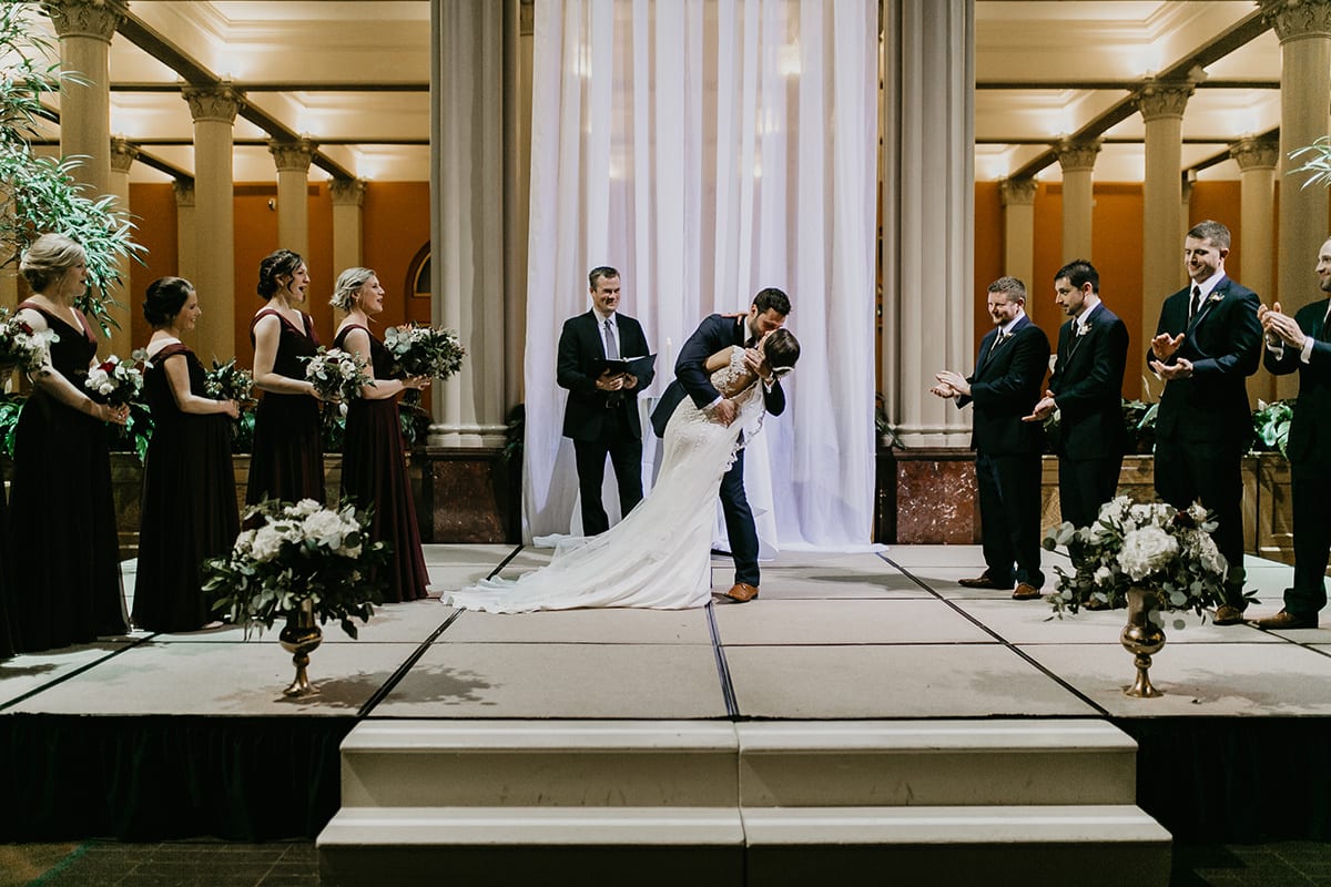 Rachel Traxler Photography, Landmark Center, Landmark Center wedding, Saint Paul wedding, wedding venues, winter flowers, winter bouquet, burgundy bouquet, red bouquet, red flowers, burgundy flowers, winter wedding inspiration, winter bride, winter flowers, winter bouquet, Saint Paul wedding florist, Minneapolis wedding florist, Artemisia Studios