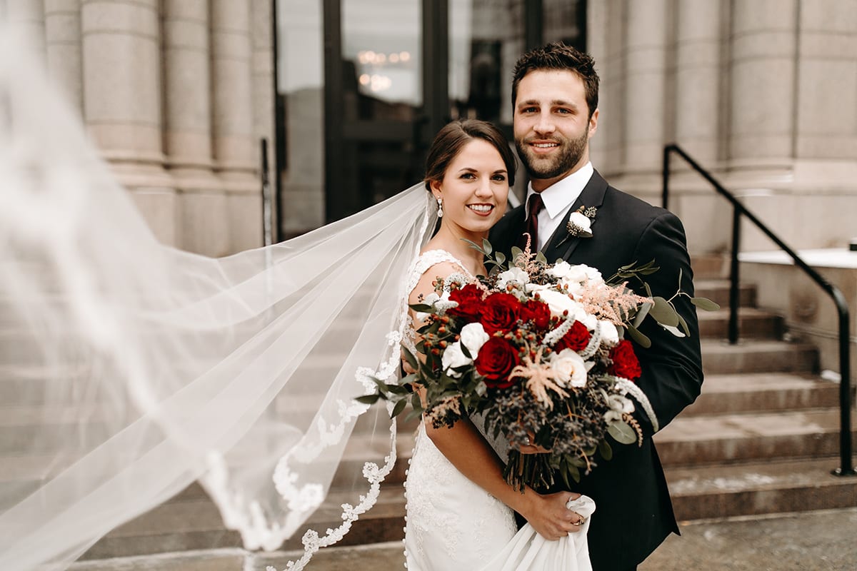 Rachel Traxler Photography, Landmark Center, Landmark Center wedding, Saint Paul wedding, wedding venues, winter flowers, winter bouquet, burgundy bouquet, red bouquet, red flowers, burgundy flowers, winter wedding inspiration, winter bride, winter flowers, winter bouquet, Saint Paul wedding florist, Minneapolis wedding florist, Artemisia Studios