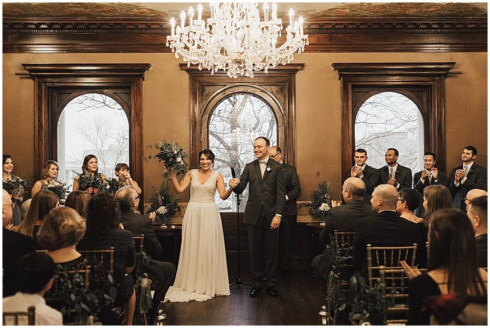 Kiana Grant Photography, Semple Mansion, winter wedding, Minneapolis wedding, Minneapolis mansion, winter flowers, winter wedding floral, wedding ceremony, aisle decor, floral decor, ceremony floral, bride, bridal bouquet, grom